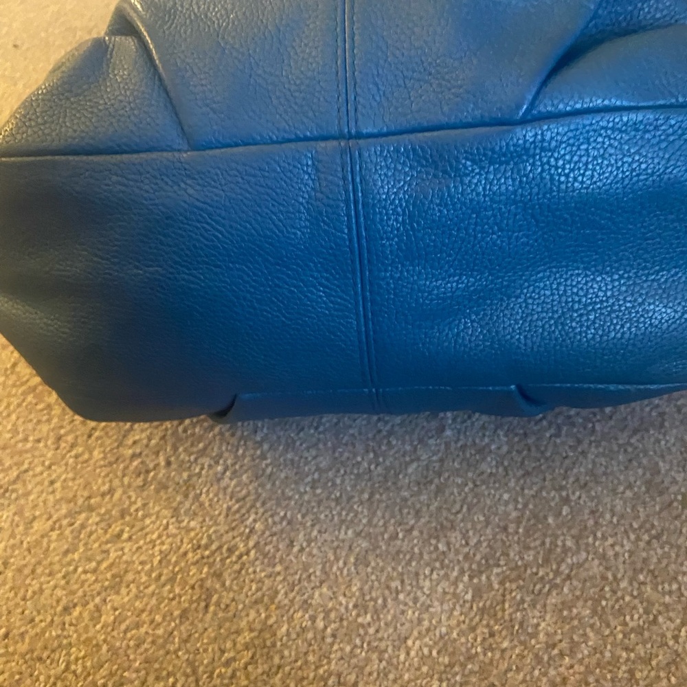 Blue leather coach bag.